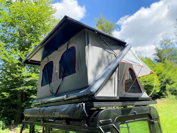 Oryx Solutions Alu Hartschalen Dachzelt Elephant blauer Himmel baeume wiese geländewagen