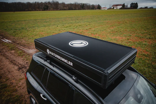 Naturbummler hartschalen Klappdachzelt alu-loft XXL 4 personen geschlossen auf pkw